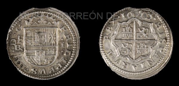 Un real (reproducción uso personal o editorial)